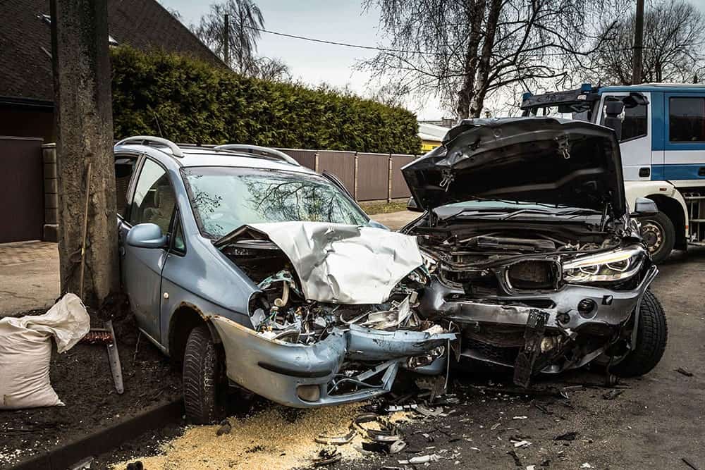 two car accident on the side of the road