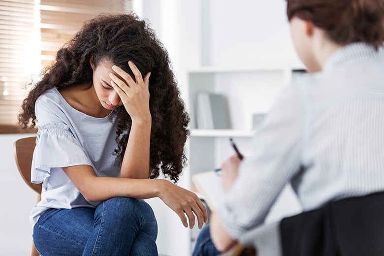 woman upset at doctors office