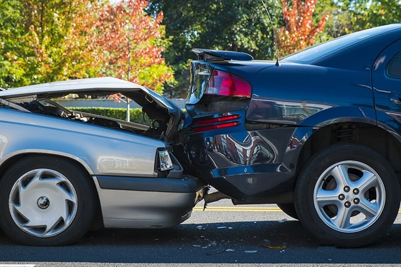 two car accident on the side of the road